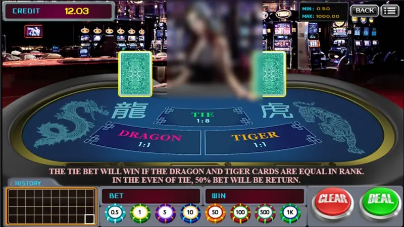 Dragon Tiger table before the deal, two face-down cards, CREDIT 12.03 and the CLEAR and DEAL buttons lit