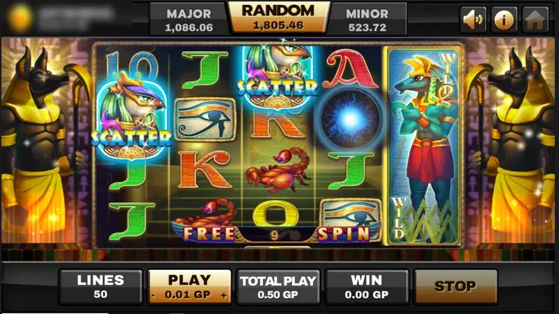 Egypt Queen free spins: dark temple background with golden Anubis statues, FREE SPIN lettered under the reels and a blue orb symbol