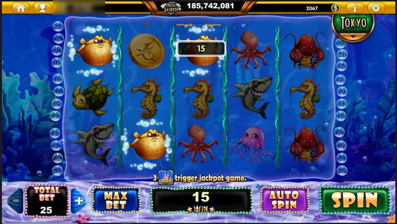 A puffer fish, sharks and turtles on the reels with a win of 15 marked on reel three