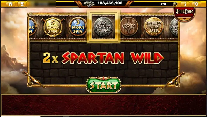 Sparta Legacy bonus reel of round shields labelled 5 MORE SPIN, 3 MORE SPIN, 2x SPARTAN WILD, COIN and SPARTAN WILD REEL, with 2x SPARTAN WILD selected and a START button