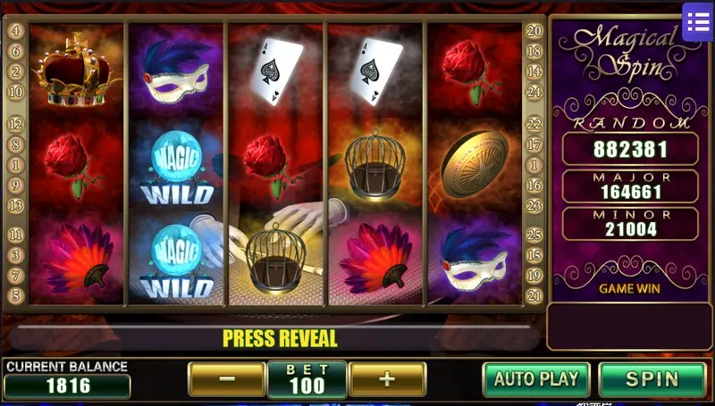 Magical Spin slot on Mega888 with a crown, red roses, feathered masks, aces of spades, birdcages and two MAGIC WILD crystal balls, bet 100 with Press Reveal