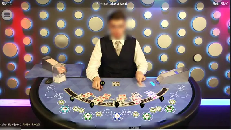 Soho Blackjack 2 with a dealer in a waistcoat behind a blue felt, chip stacks of 25 to 250 at the seats and hand totals of 15, 16, 17 and 18